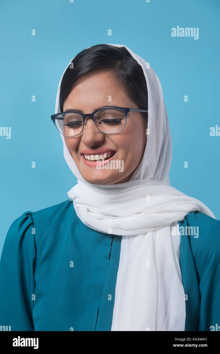 Woman In white dupatta eyes closed Stock Photo