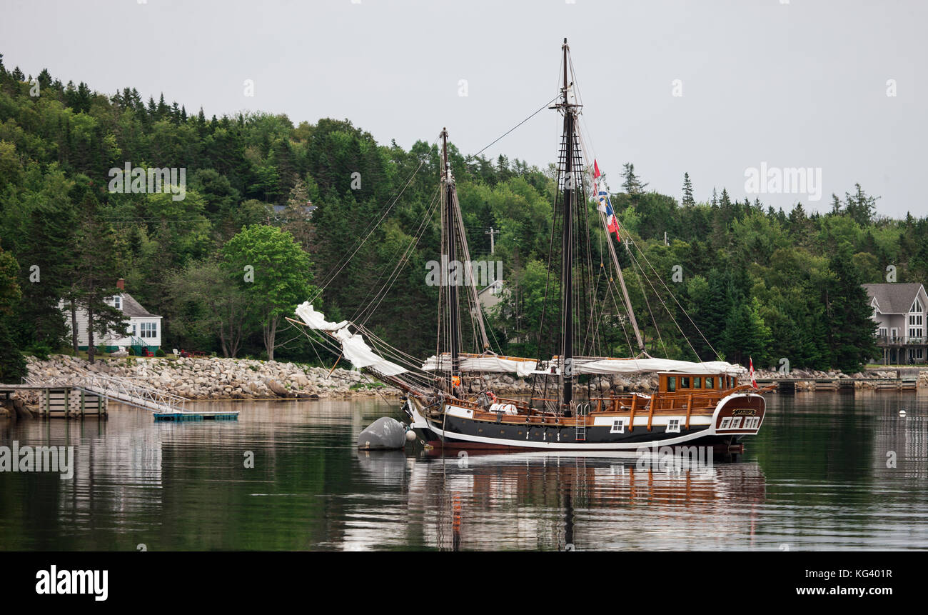 Nova Scotia, Canada - August 30, 2017: A quiet bay off of the Atlantic Ocean on Nova Scotia's south shoreline provides a perfect place for sailboats t Stock Photo