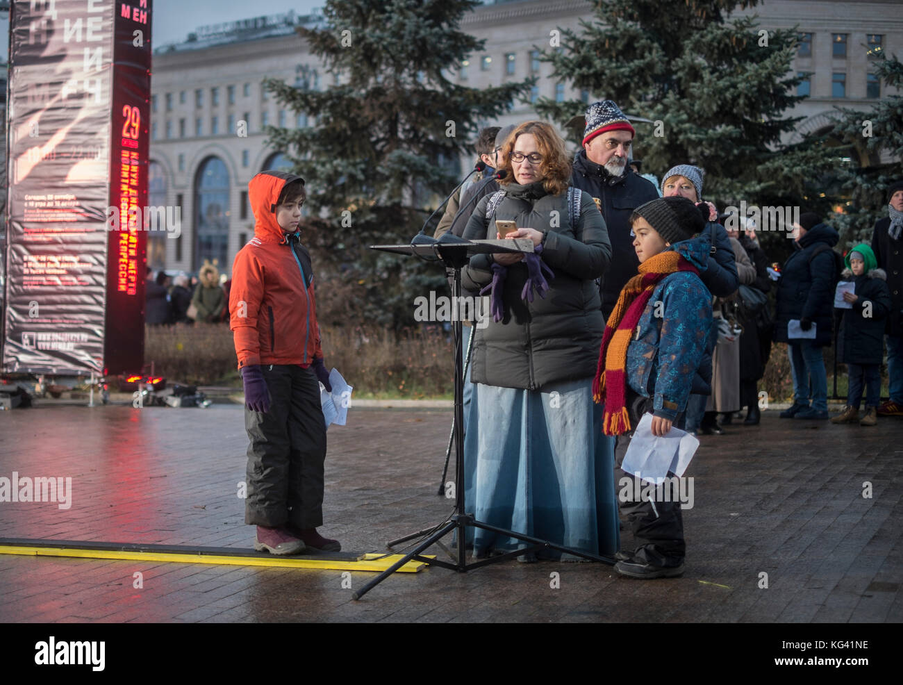 More than 5,000 people took part in a ceremony in Moscow's Lubyanka Square on October 29, 2017, to commemorate the victims of political terror during the Communist era. For twelve hours, people read names of those who were killled or disappeared, especially at the height of Stalinist terror in 1937-1938. In Moscow alone, more than 30,000 people were murdered. Reading the names of the victims has become an annual tradition since 2007. Stock Photo