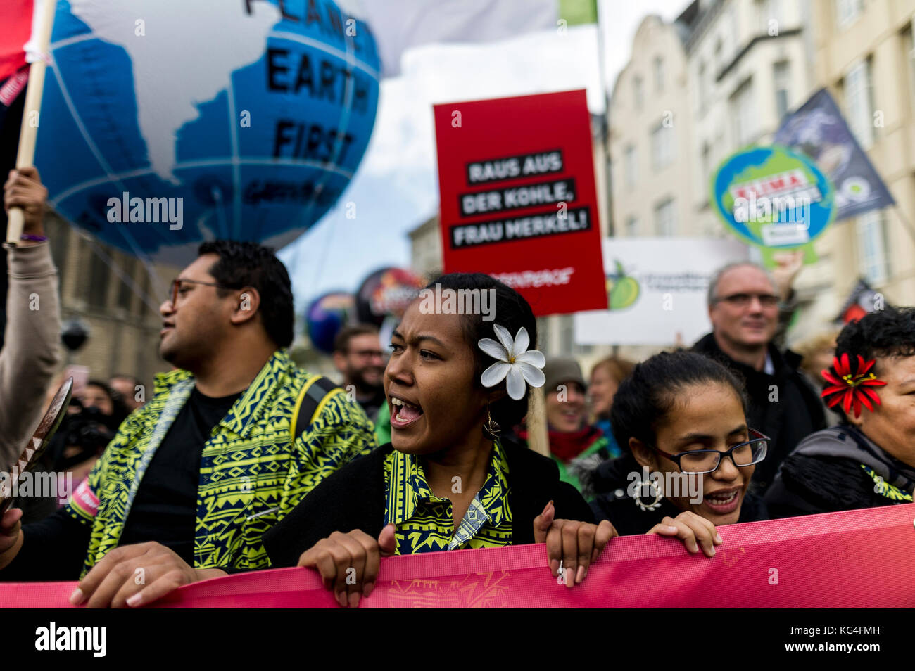 Bonn, Germany. 4th Nov, 2017. Members of the Climate Warriors from Fiji stand at the front of the rally. According to organizers, 25,000 people from around the world demonstrate for climate justice and 100 percent renewable energy in harmony with nature.The 23th United Nations Climate Change Conference, Cop 23, will take place from 06 to 17 November 2017 in Bonn. Credit: Markus Heine/SOPA/ZUMA Wire/Alamy Live News Stock Photo