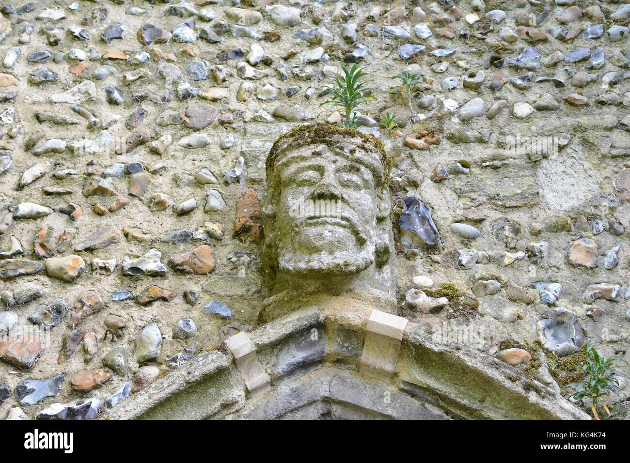 Carved stone face on wall hi-res stock photography and images - Alamy