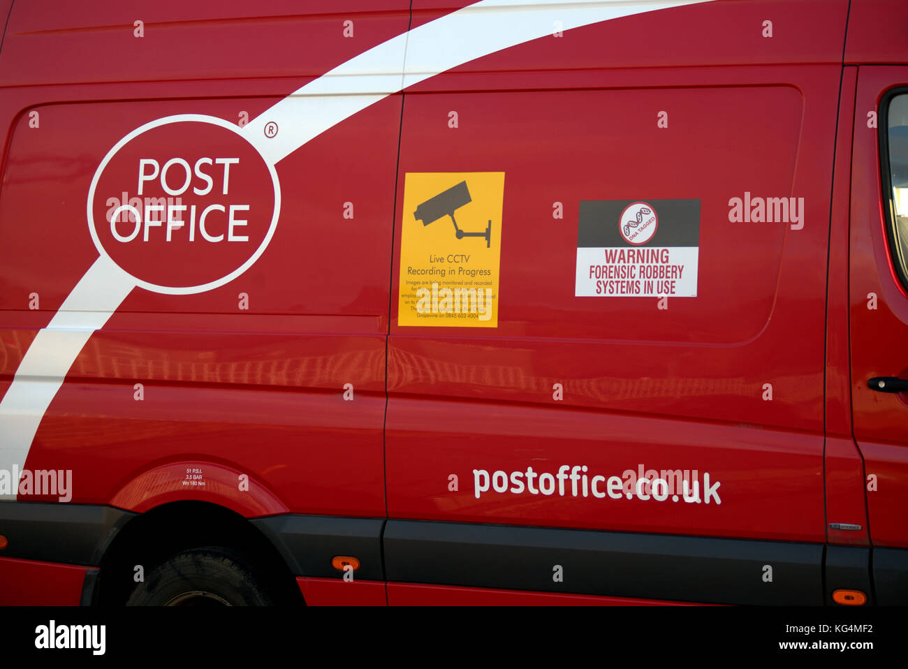 royal mail delivery van glasgow logo red car parked cctv warning stickers yellow forensic labels post office Stock Photo