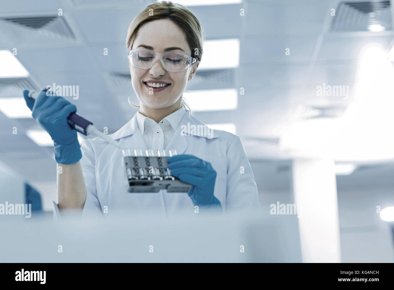 Joyful nice scientist working Stock Photo