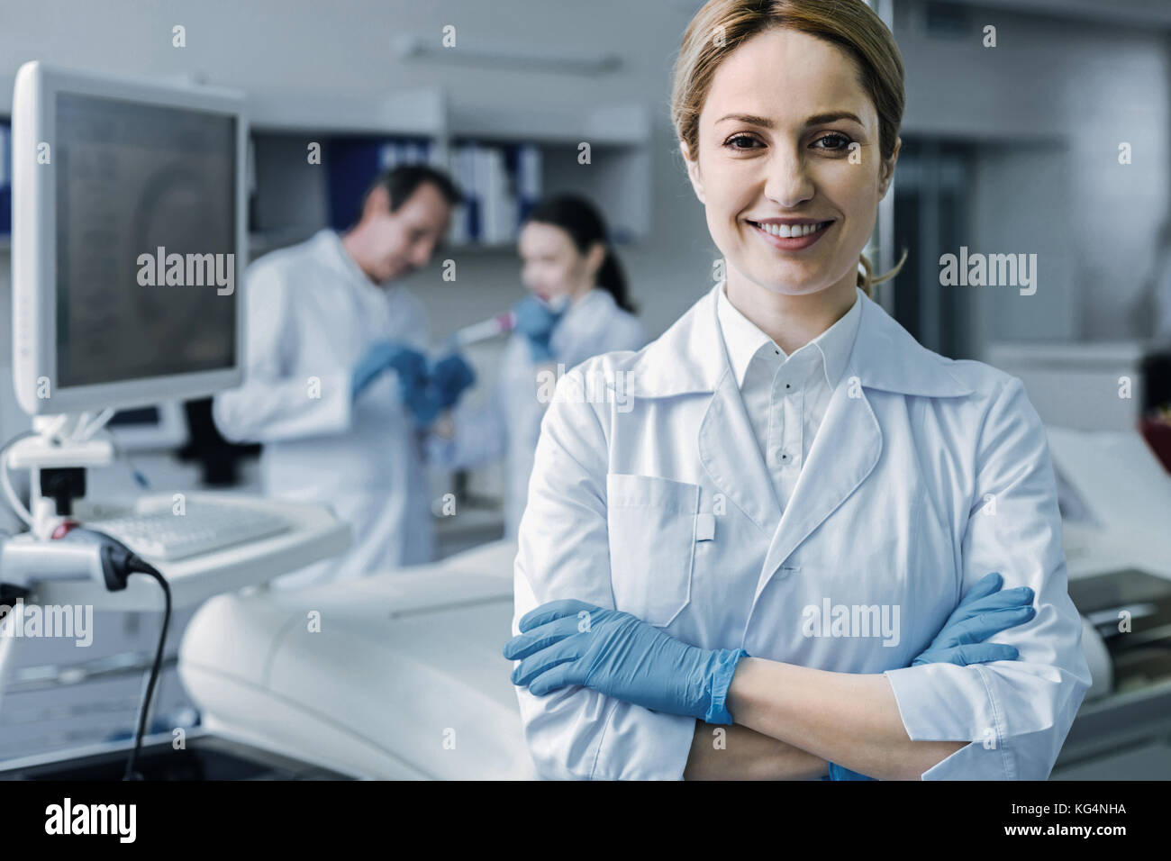 Confident nice scientist looking at you Stock Photo