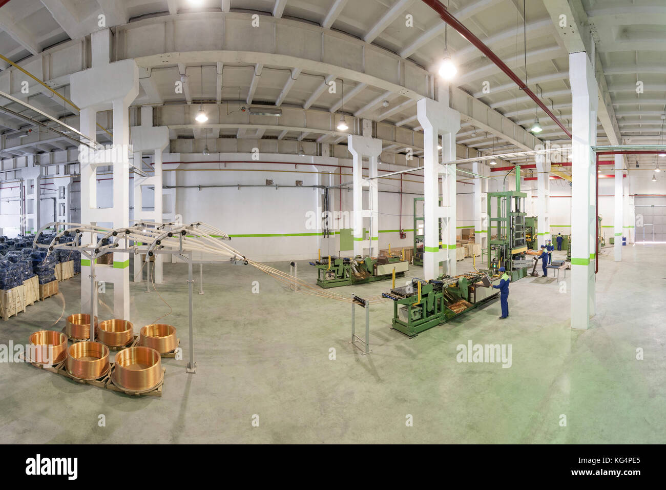 at the factory equipment for the deployment of copper tubes from rolls ...