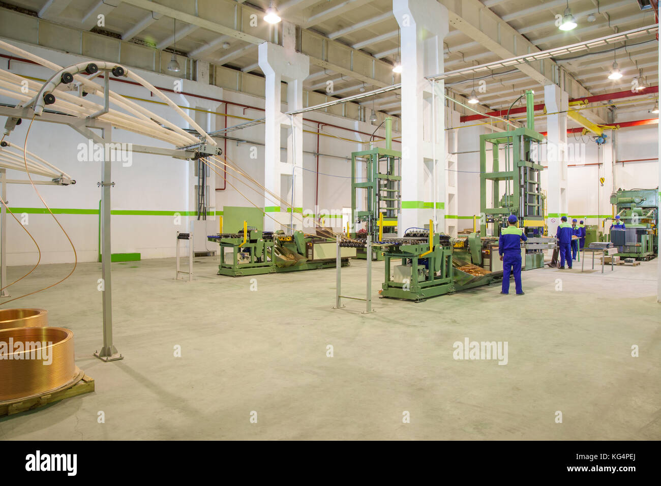 at the factory equipment for the deployment of copper tubes from rolls ...