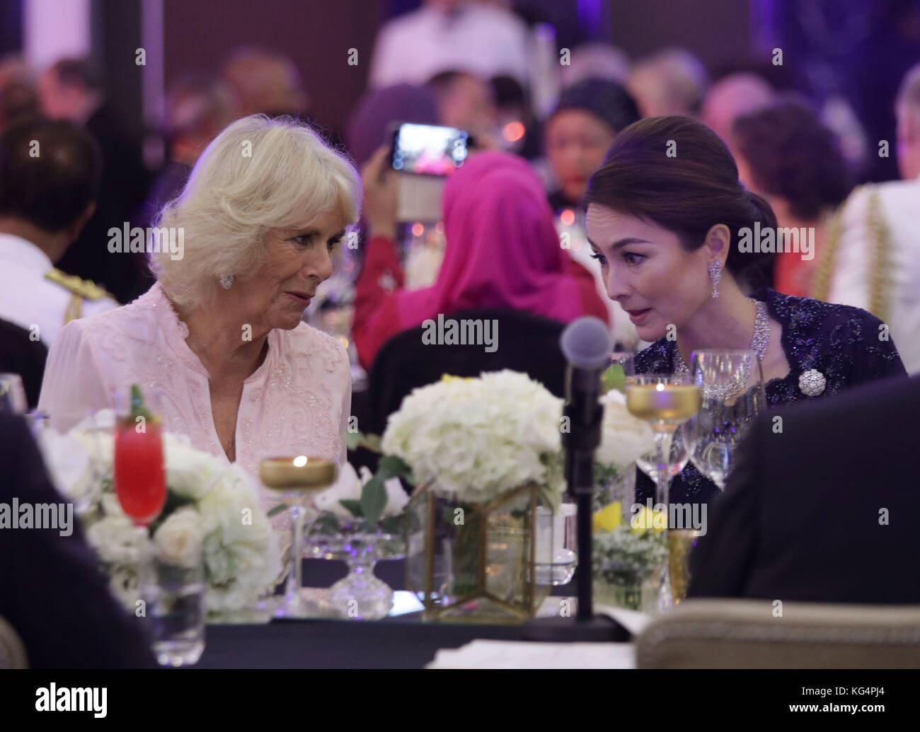 The Duchess of Cornwall speaks to Tuanku Zara Salim as she attends a Gala  Dinner to celebrate 60 years of UK/Malaysia diplomatic ties at the Majestic  Hotel in Kuala Lumpa, Malaysia, during