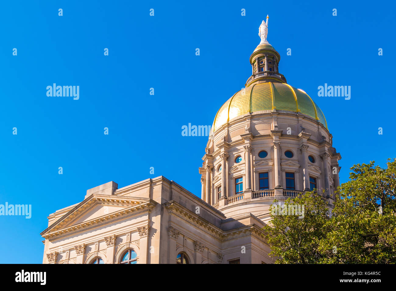 Bottom view of the tholobate and the dome of Georgia State Capitol on the background of clear sky, Atlanta, USA Stock Photo