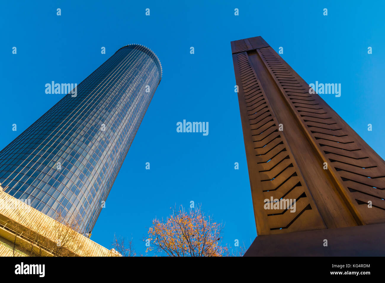 Bottom view of the skyscraper and the Andrew Young Obelisk on the background of clear sky, Atlanta, USA Stock Photo
