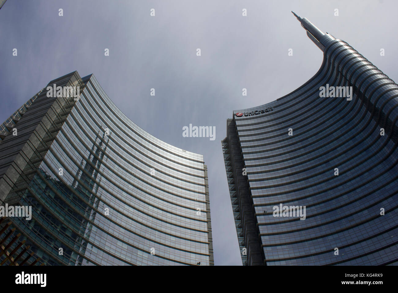 MILAN, ITALY - MAY 10 2014: Architectural detail of the glass facade on the Unicredit tower building in Milan, the tallest skyscraper in Italy Stock Photo