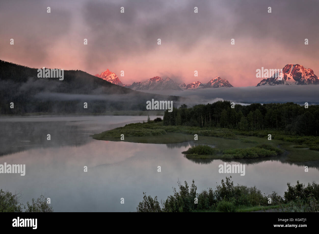 WY02546-00...WYOMING - Sunrise over Mount Moran and the Teton Range from the Oxbow Bend Turnout on the Snake River in Grand Teton National Park. Stock Photo