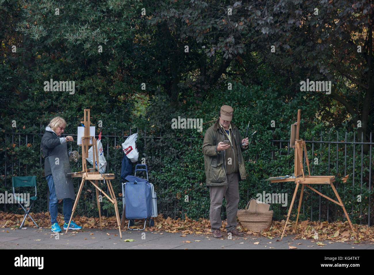 Members of the Dulwich Art Group paint an urban Autumn landscape on Denmark Hill, on 2nd October 2017, in the south London borough of Lambeth, England. Stock Photo
