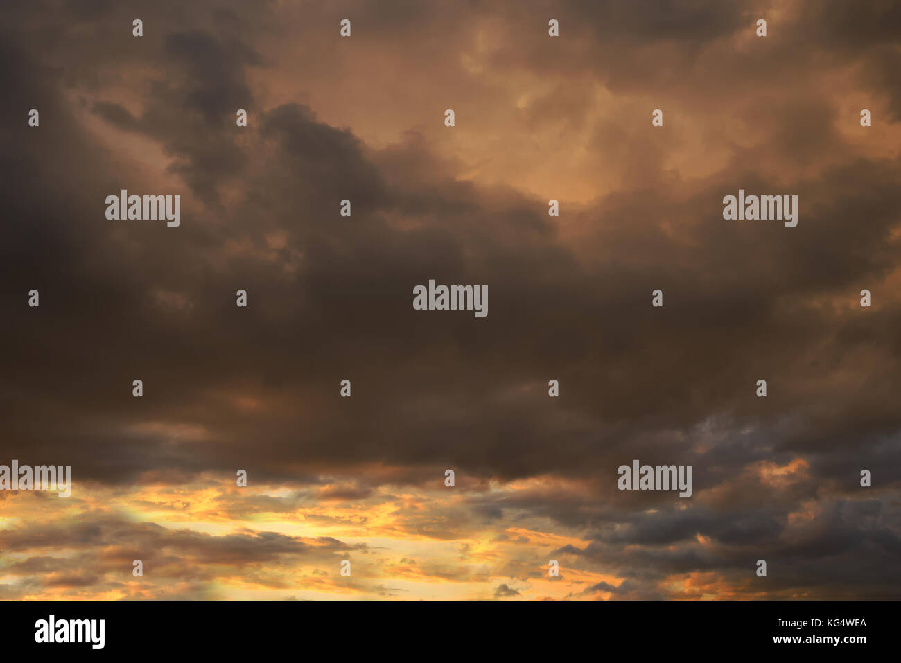 Dark sky with blak clouds brings storm rain at the sunset Stock Photo ...