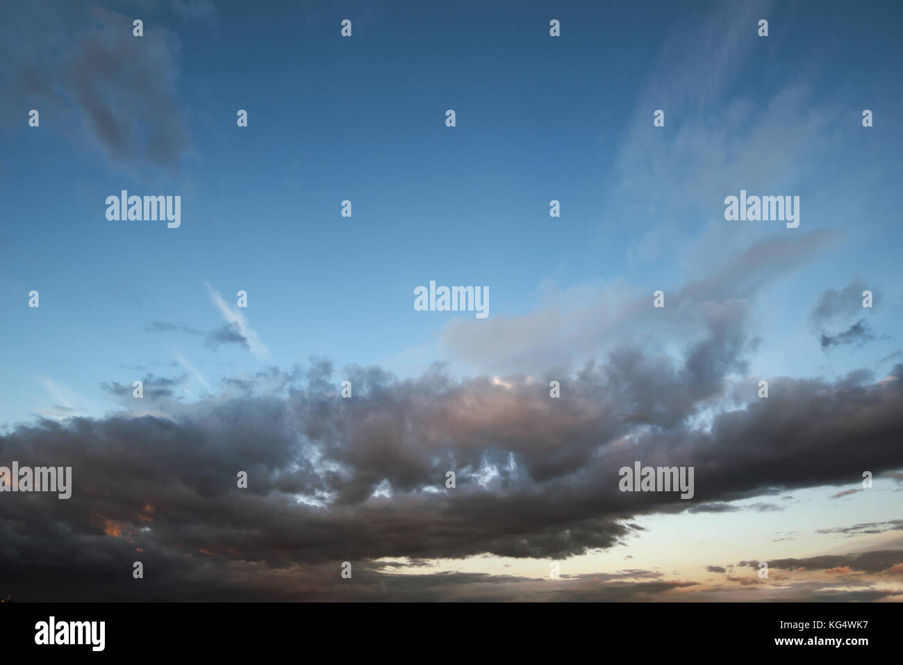 Dark sky with blak clouds brings storm rain at the sunset Stock Photo ...