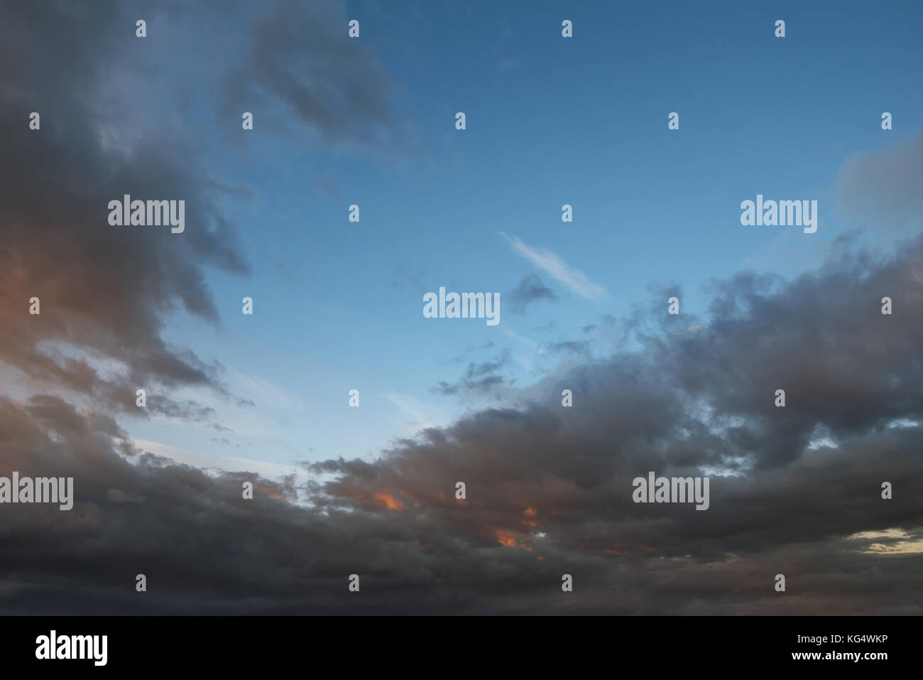 Dark sky with blak clouds brings storm rain at the sunset Stock Photo ...