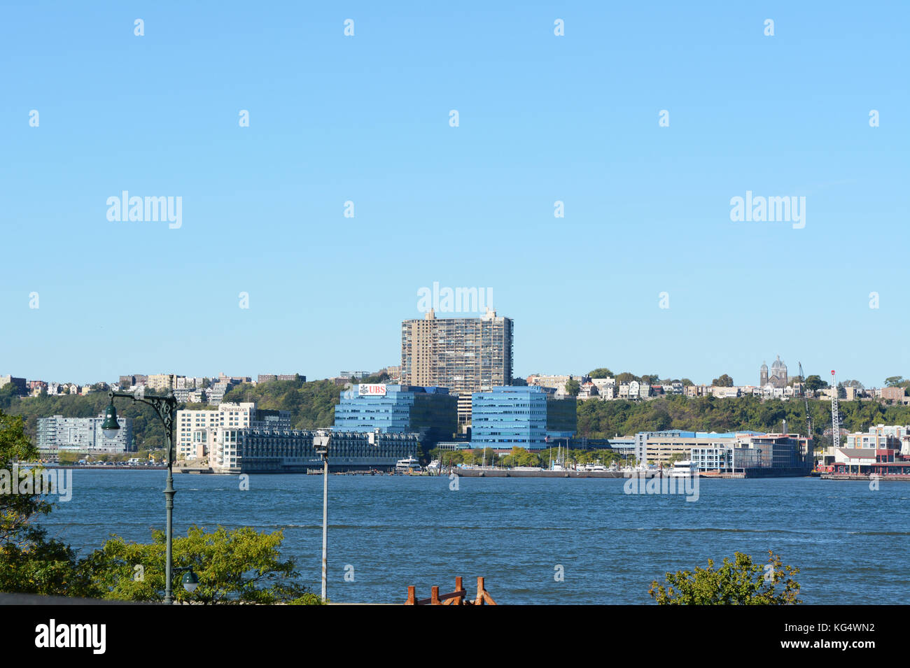 NEW YORK - OCTOBER 20, 2017: View across the Hudson River to New Jersey, where the Sheraton Hotel and UBS Financial Services stand at Weehawken Cove a Stock Photo