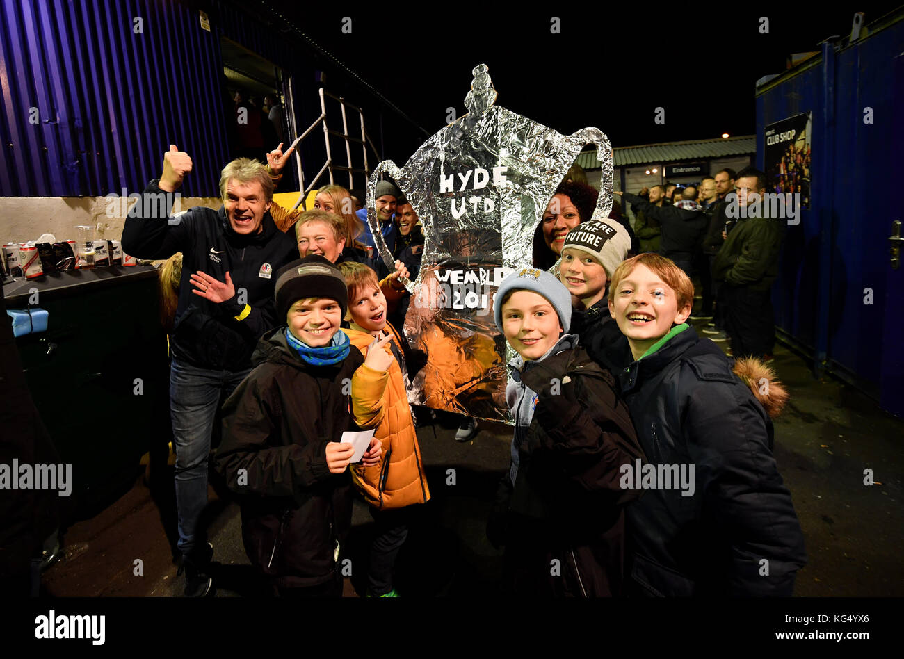 Hyde fans with a tin foil FA Cup during the Emirates FA Cup, first
