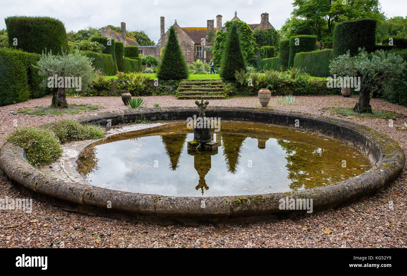 Round pond in the Mediterranean garden at Cothay Manor near Wellington in Somerset UK Stock Photo