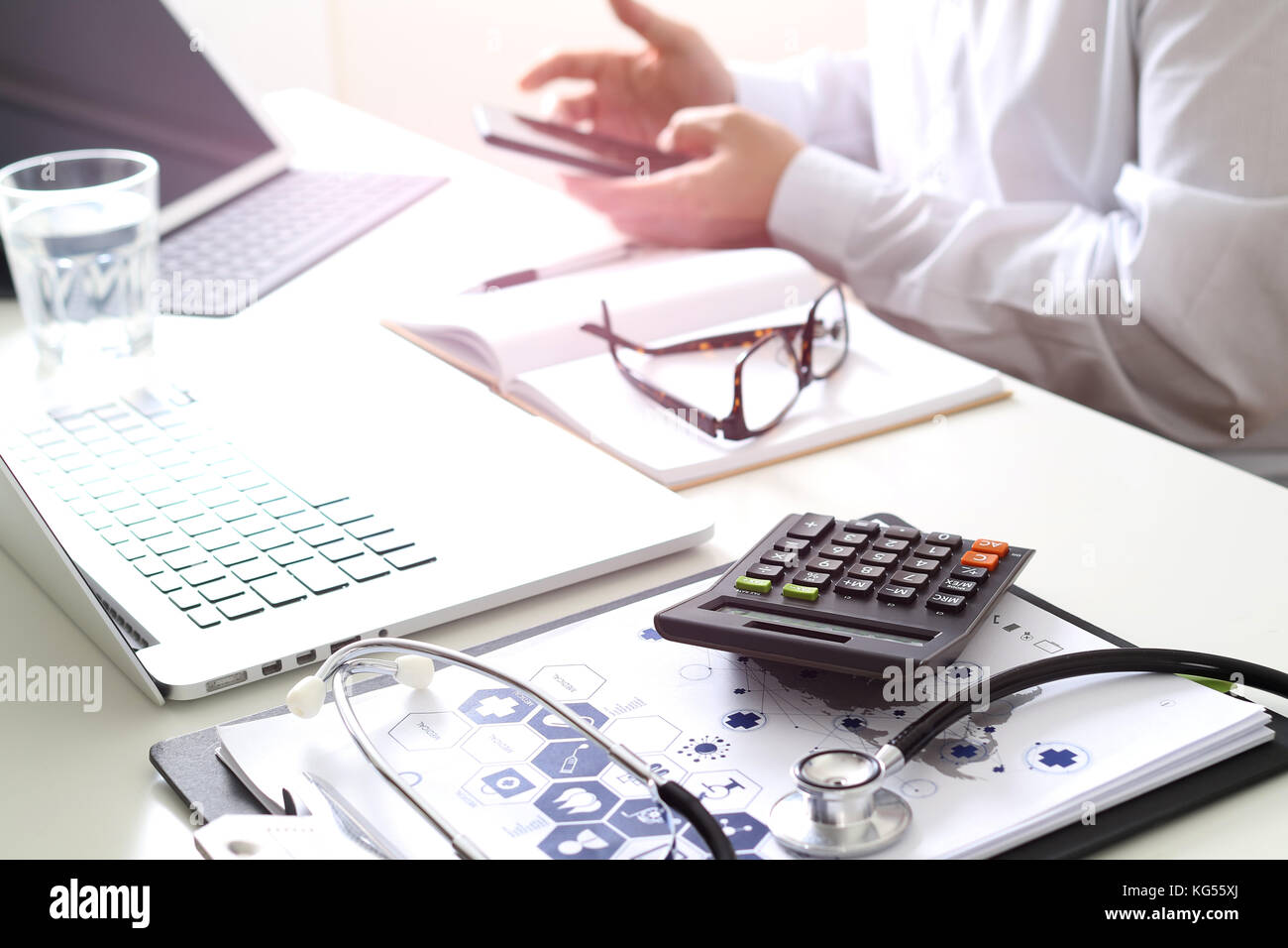 Healthcare costs and fees concept.Hand of smart doctor used a