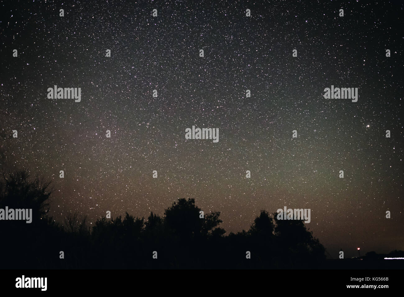 Background of bright starry night sky with lights upon on it and