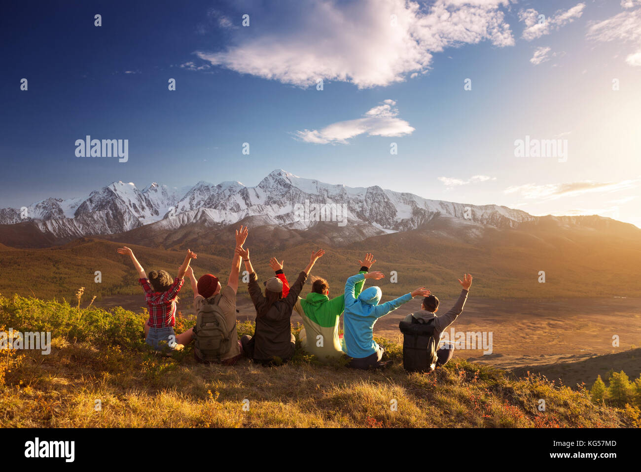 Group happy friends having fun mountain top Stock Photo