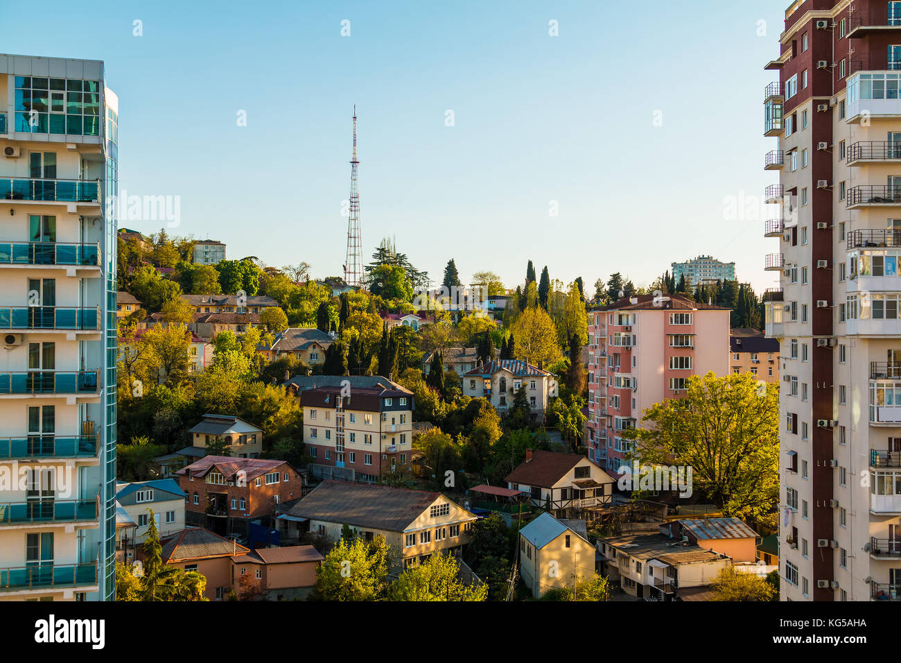 Aerial view of apartment buildings in the light of the setting sun ...