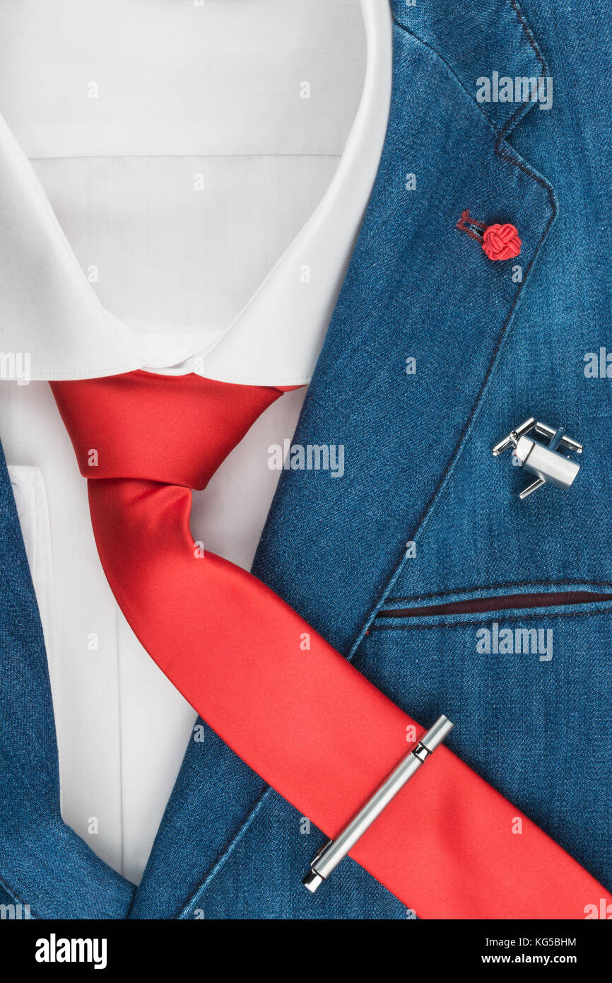 Men's fashion. Elegant denim jacket with a red tie. Male jacket with