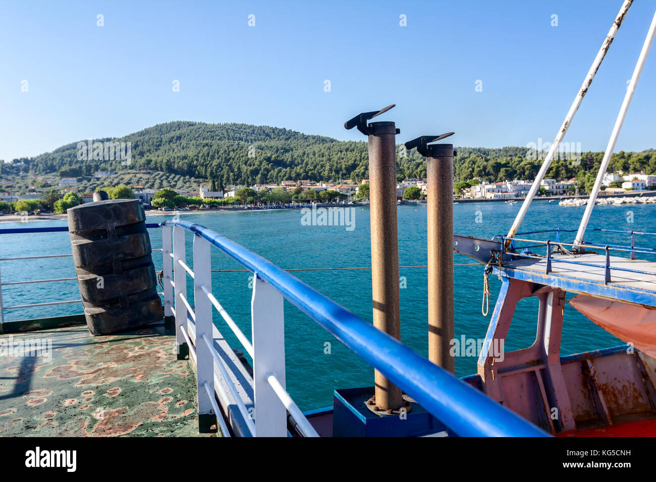 View of the fishing ship or ferry boat deck with exhaust pipe with metal cover. Stock Photo