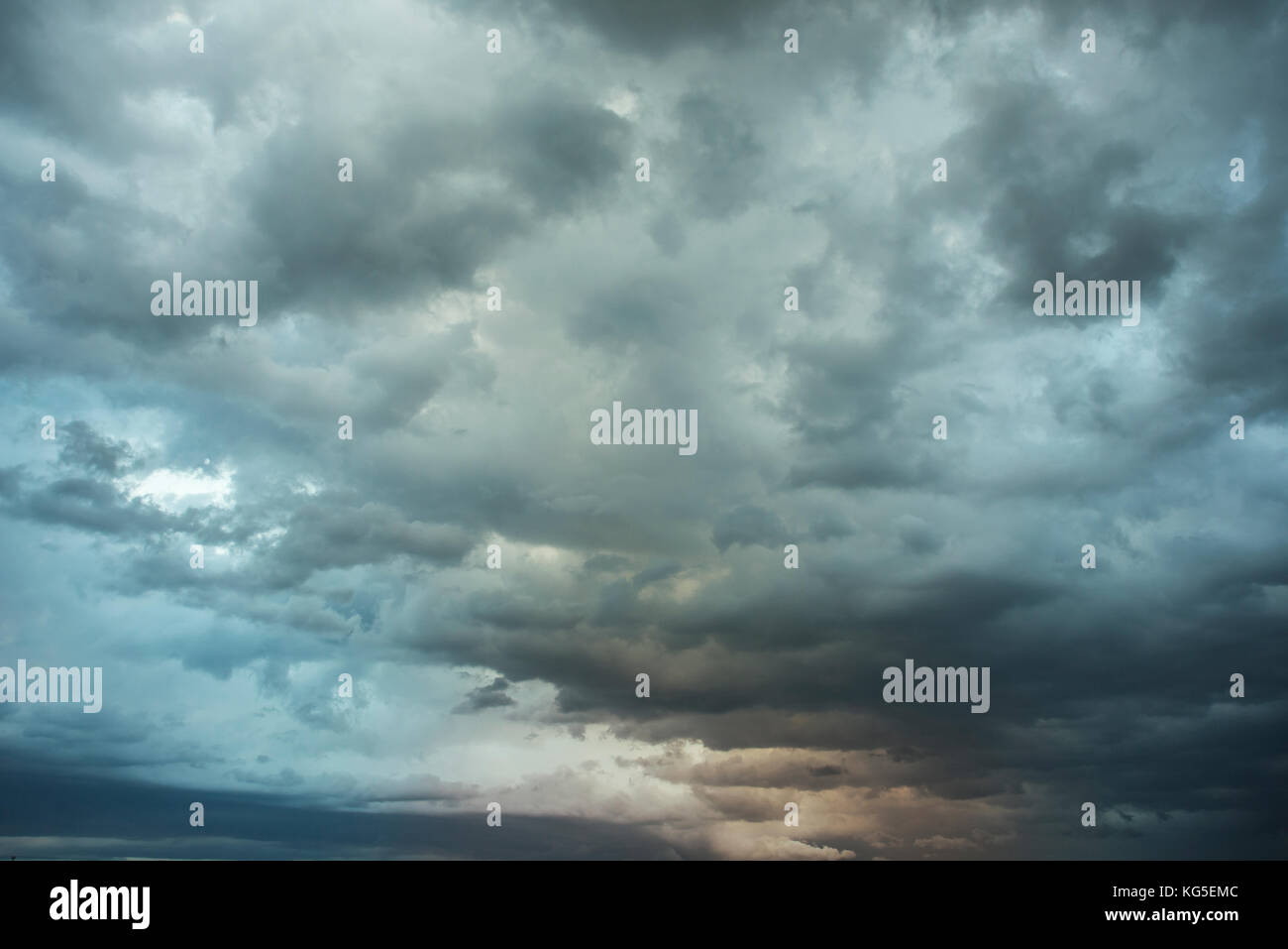 Dark sky with black clouds brings storm rain Stock Photo - Alamy