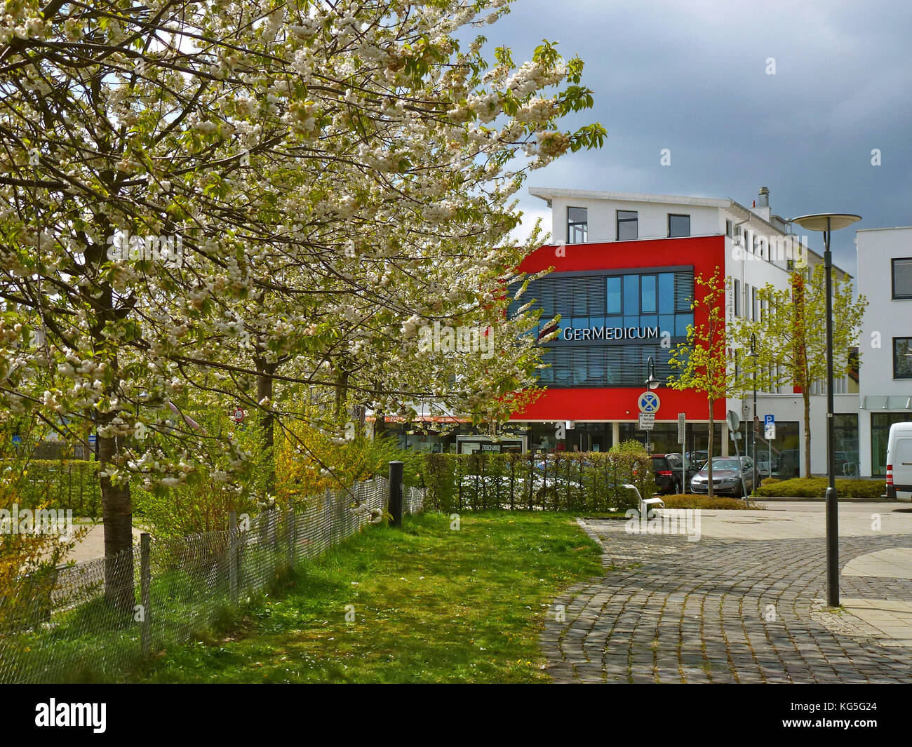 Germany, Bavaria, Germering, Germedicum, medical centre, blooming cherry trees, spring Stock Photo