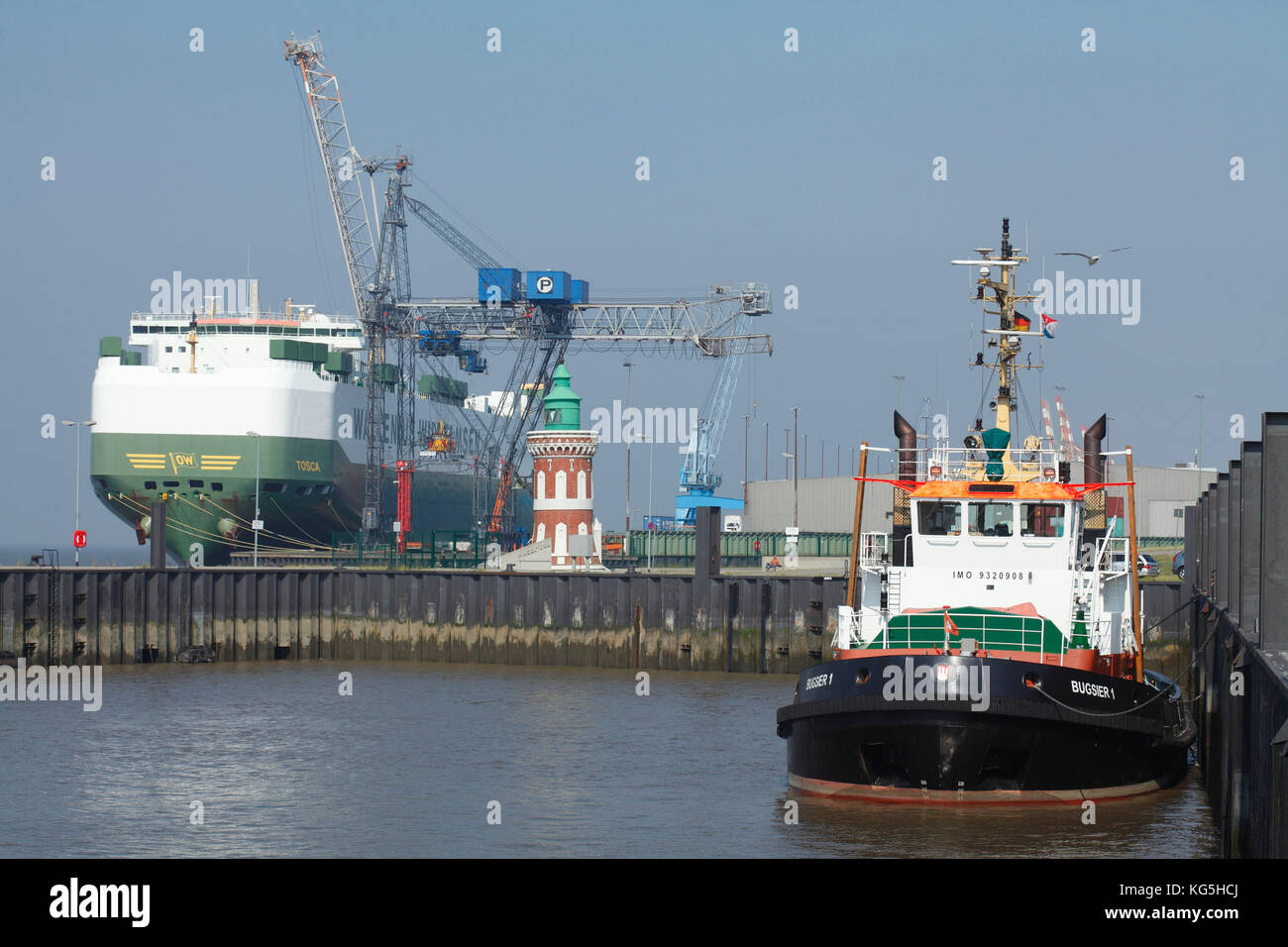 Weser promenade, harbour, car carrier, autoterminal, oceangoing tug Bremerhaven, Bremen, Germany Stock Photo