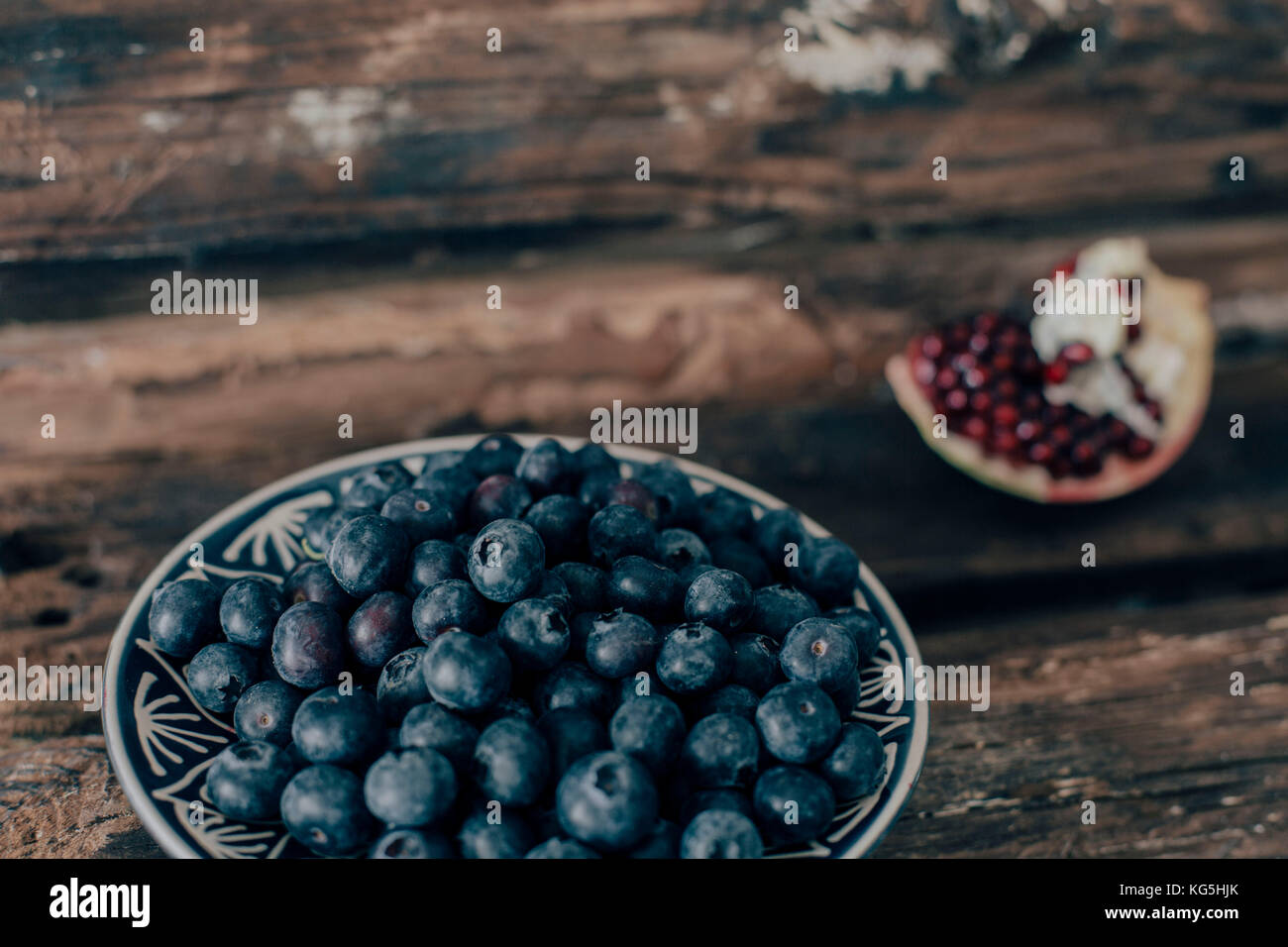 Blueberries and pomegranate Stock Photo Alamy