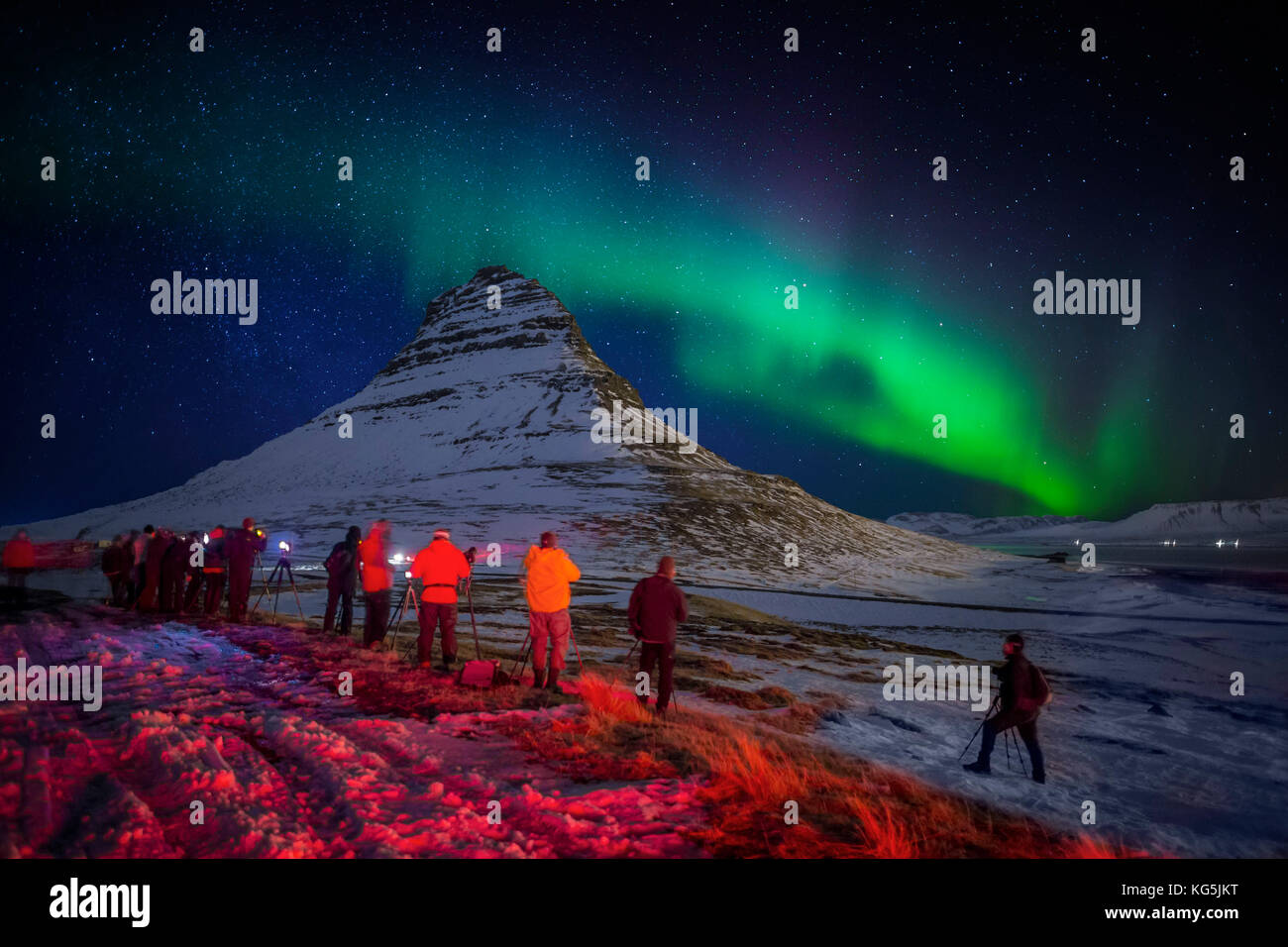 Aurora Borealis or Northern lights over Mt Kirkjufell, Snaefellsnes Peninsula, Iceland Photographing Kirkjufell (Church Mountain) with the Auroras in Grundarfjordur, on the north side of Snaefellsnes Peninsula, Iceland Stock Photo