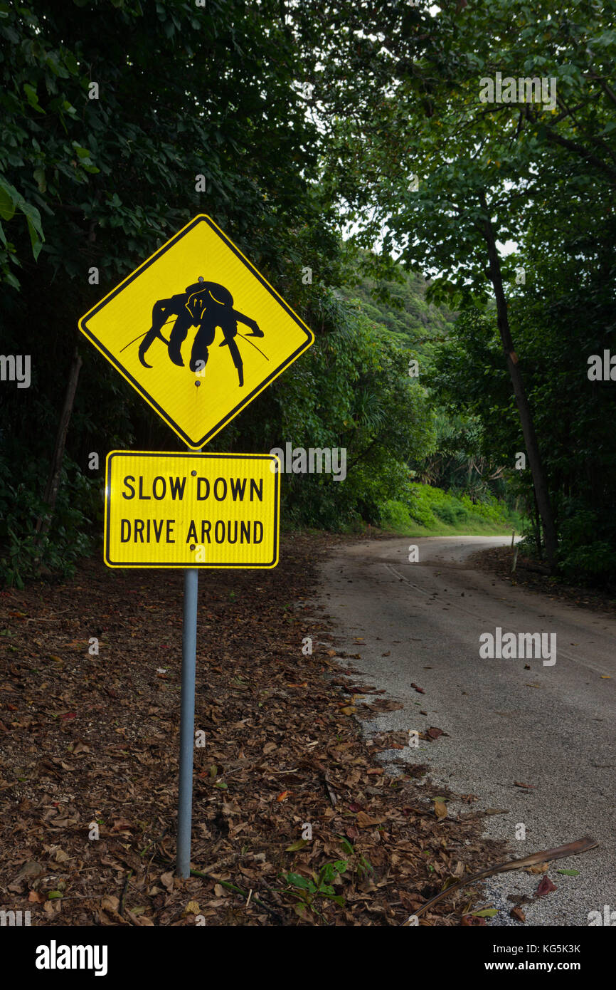 Driver Warning Sign on Road Side, Birgus latro, Christmas Island, Australia Stock Photo