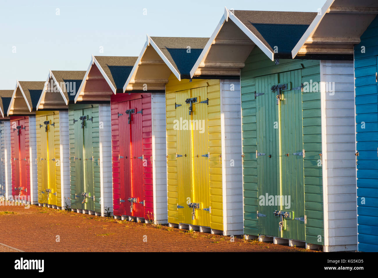 England, East Sussex, Eastbourne, Eastbourne Beach, Colourful Beach Huts Stock Photo