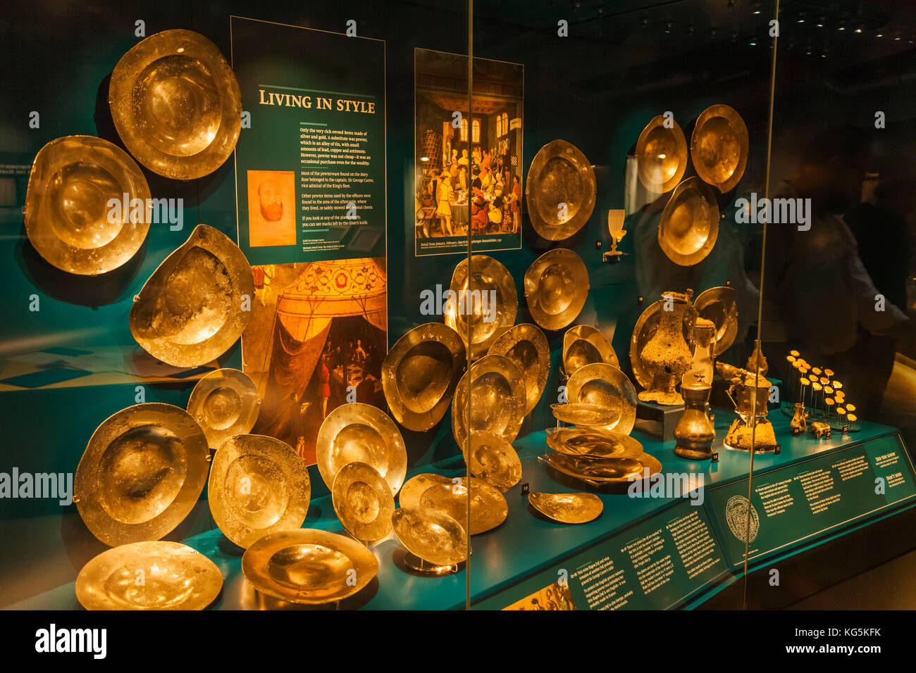 England, Hampshire, Portsmouth, Portsmouth Historic Dockyard, The Mary Rose Museum, Display of Tableware and Gold Coins from The Mary Rose Stock Photo