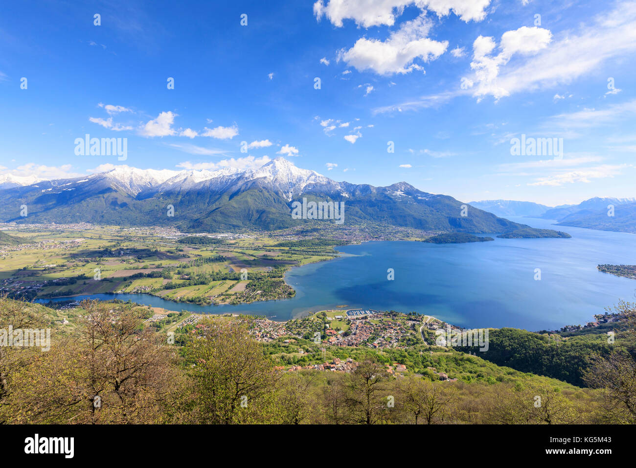 Top view of Lake Como and villages framed by snowy peaks Montemezzo Alpe Zocca Lombardy Italy Europe Stock Photo