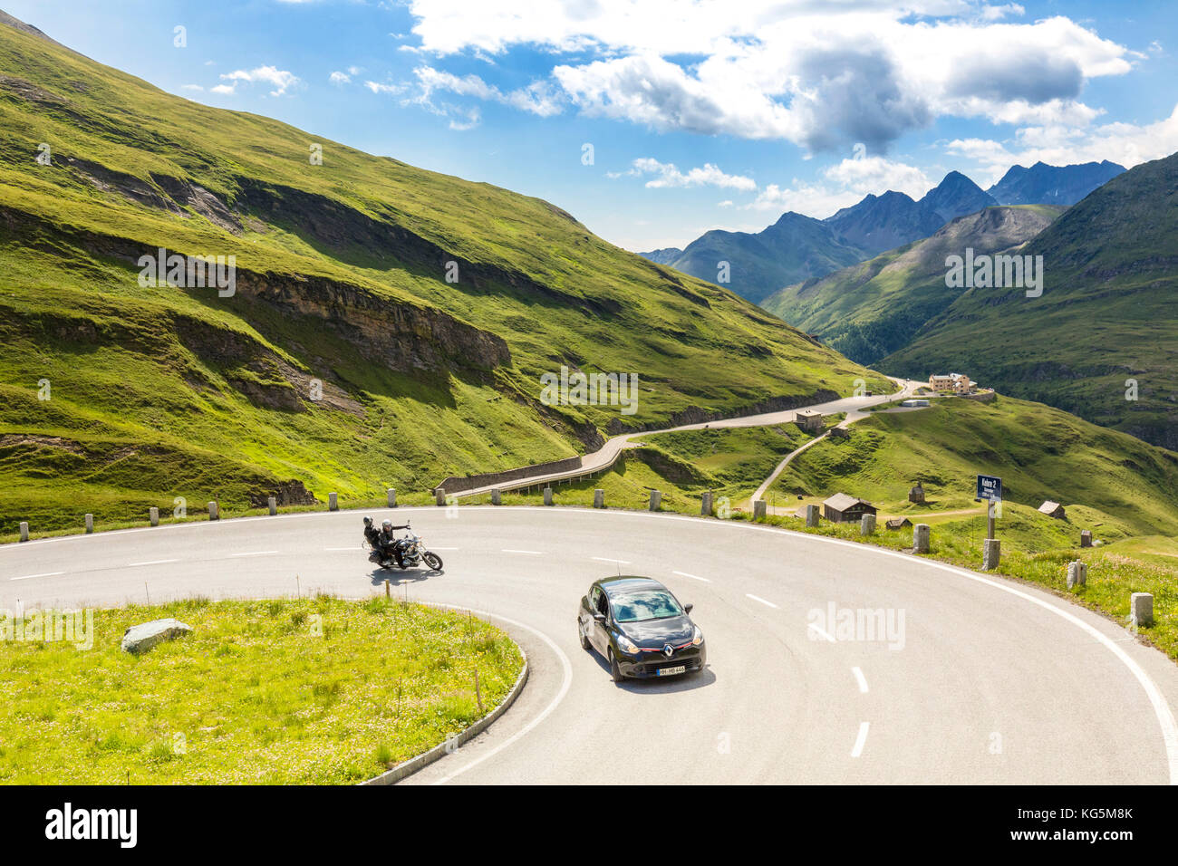 Car and motorbike on the serpentines of Hohe Tauern Grossglockner High Alpine Road, High Tauern National Park, Carinthia, Austria Stock Photo