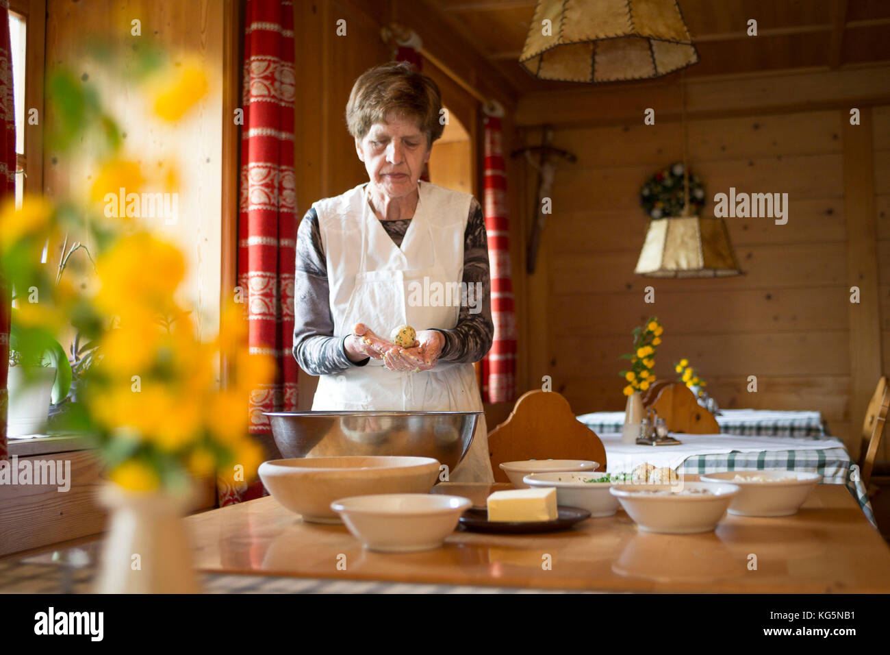 a chef show a finished handmade dumpling, (canederlo, Bolzano province, South Tyrol, Trentino Alto Adige, Italy Stock Photo