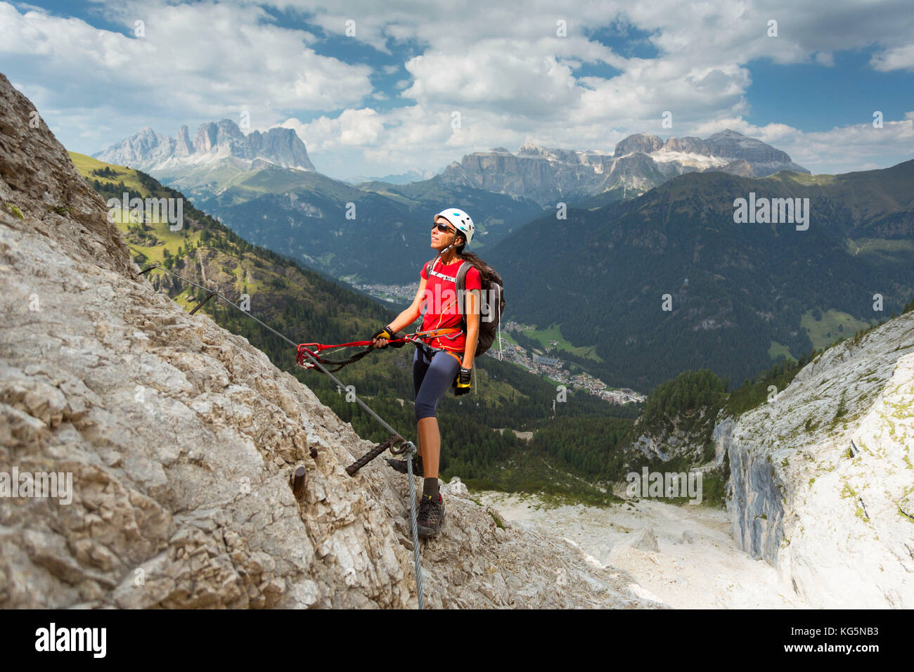 a climber looking the Panorama during a via ferrata, Trento province, Trentino Alto Adige. Italy, Stock Photo