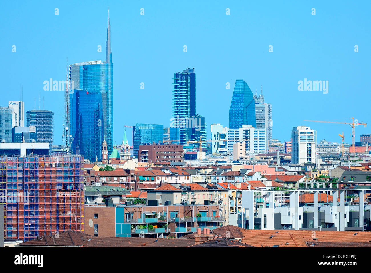 Milan, Italy, the new skyline with Porta Nuova and Citylife skyscrapers, view from Monte Stella park, on summer 2017 Stock Photo