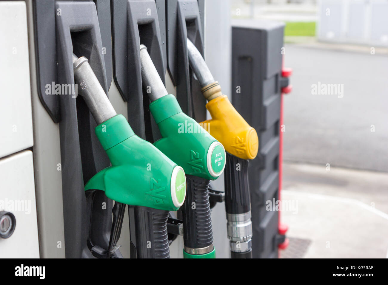 Gas filling nozzles (guns) at a gas station. Stock Photo