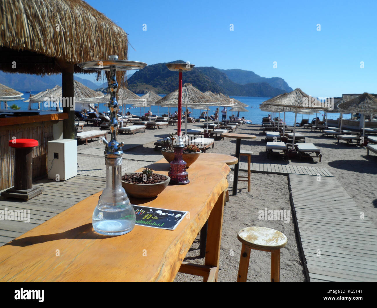 One of the many beach bars on the public beach at Icmeler, Mugla province, Turkey, Europe Stock Photo