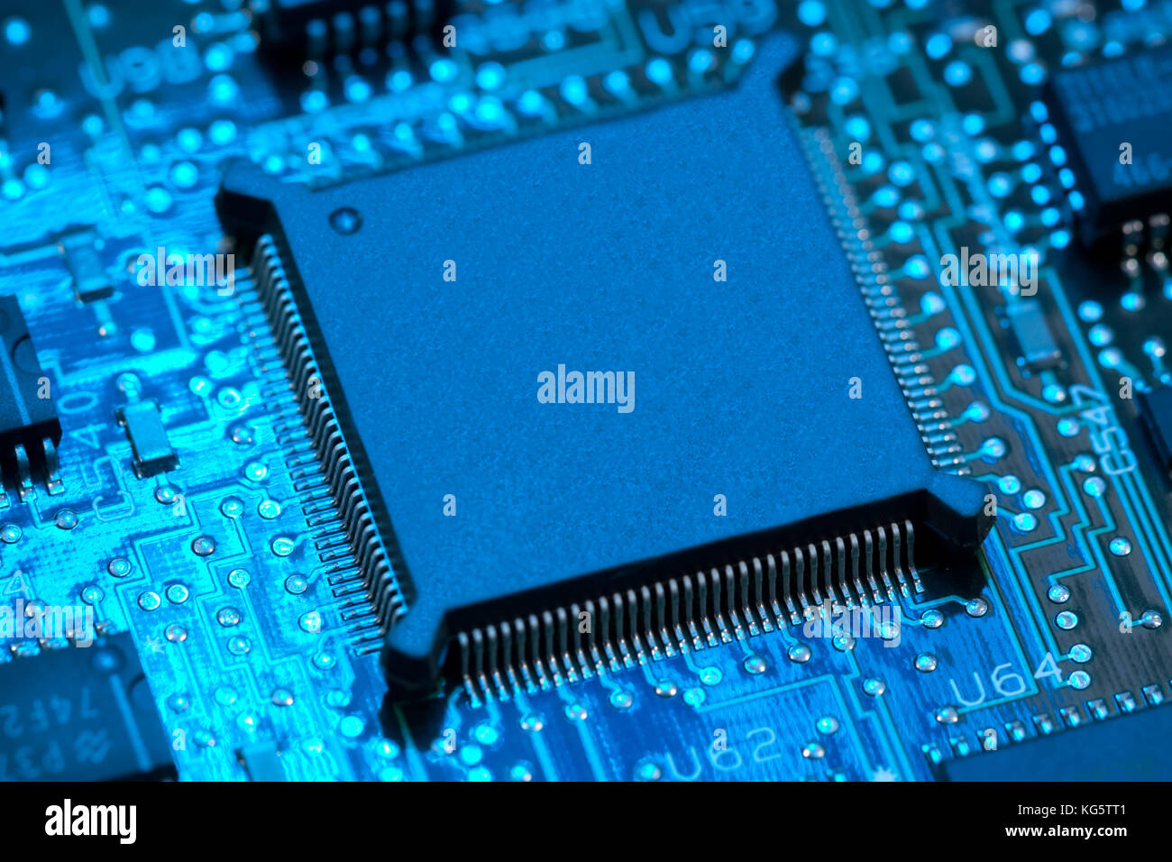 computer mainboard - dual inline modules, surface mounted devices with green, red, blue light - macro shot Stock Photo