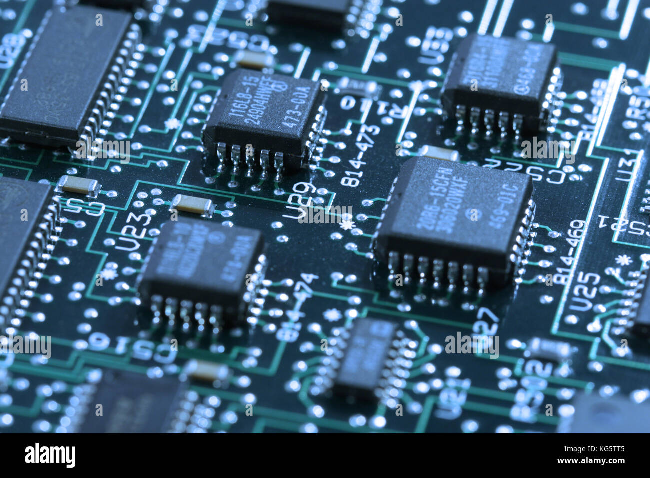 computer mainboard - dual inline modules, surface mounted devices with green, red, blue light - macro shot Stock Photo