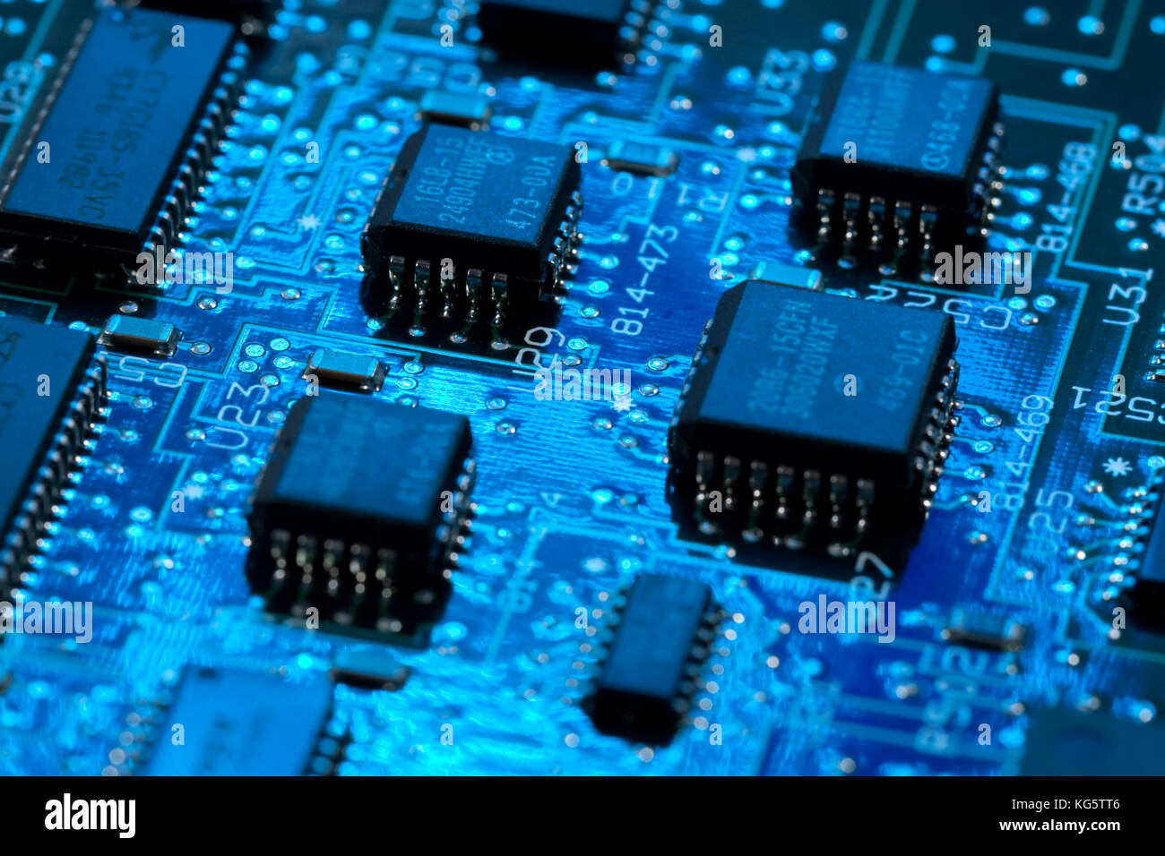 computer mainboard - dual inline modules, surface mounted devices with green, red, blue light - macro shot Stock Photo