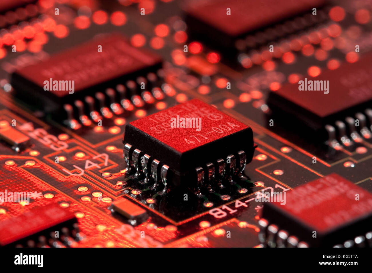 computer mainboard - dual inline modules, surface mounted devices with green, red, blue light - macro shot Stock Photo
