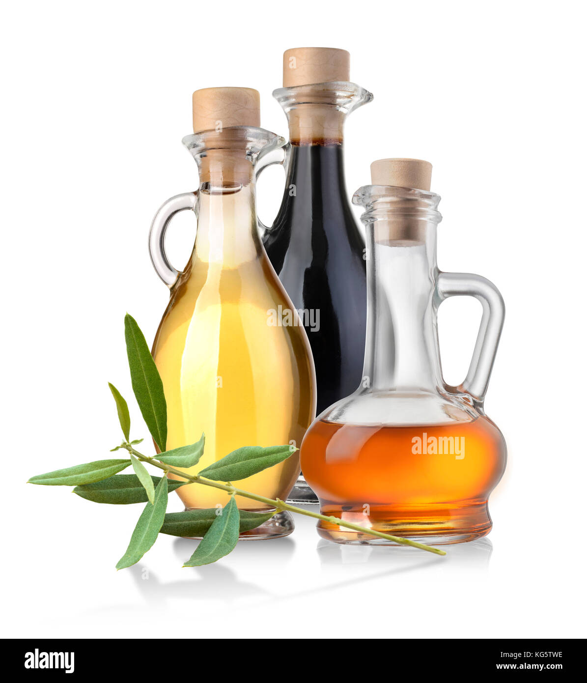 Olive oil bottles  isolated over white background with  olives with leaves Stock Photo