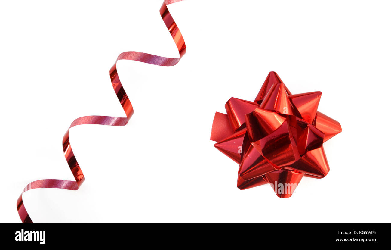 bright red curling ribbon isolated on white background Stock Photo - Alamy