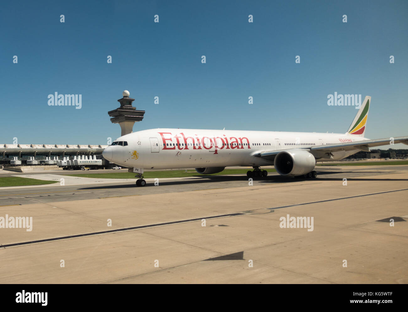 An Ethiopian Airlines Boeing 777-300ER (possibly ET-APX) plane taxiing at Washington Dulles International Airport (IAD), Dulles, VA, United States. Stock Photo